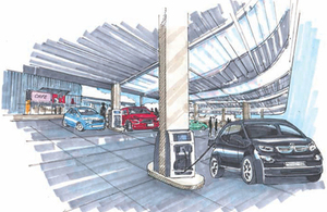 An artist's impression of an electric charge point forecourt.