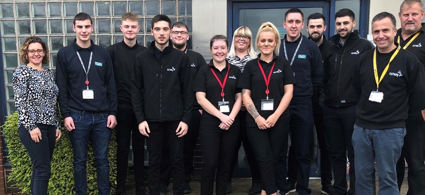 Seven of the eight new apprentices Amey apprentices and teaching staff.