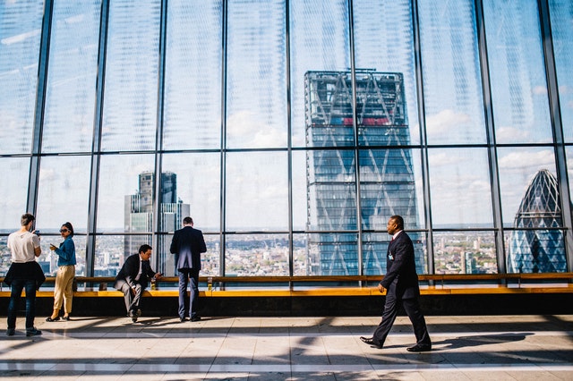 Building with man walking in front