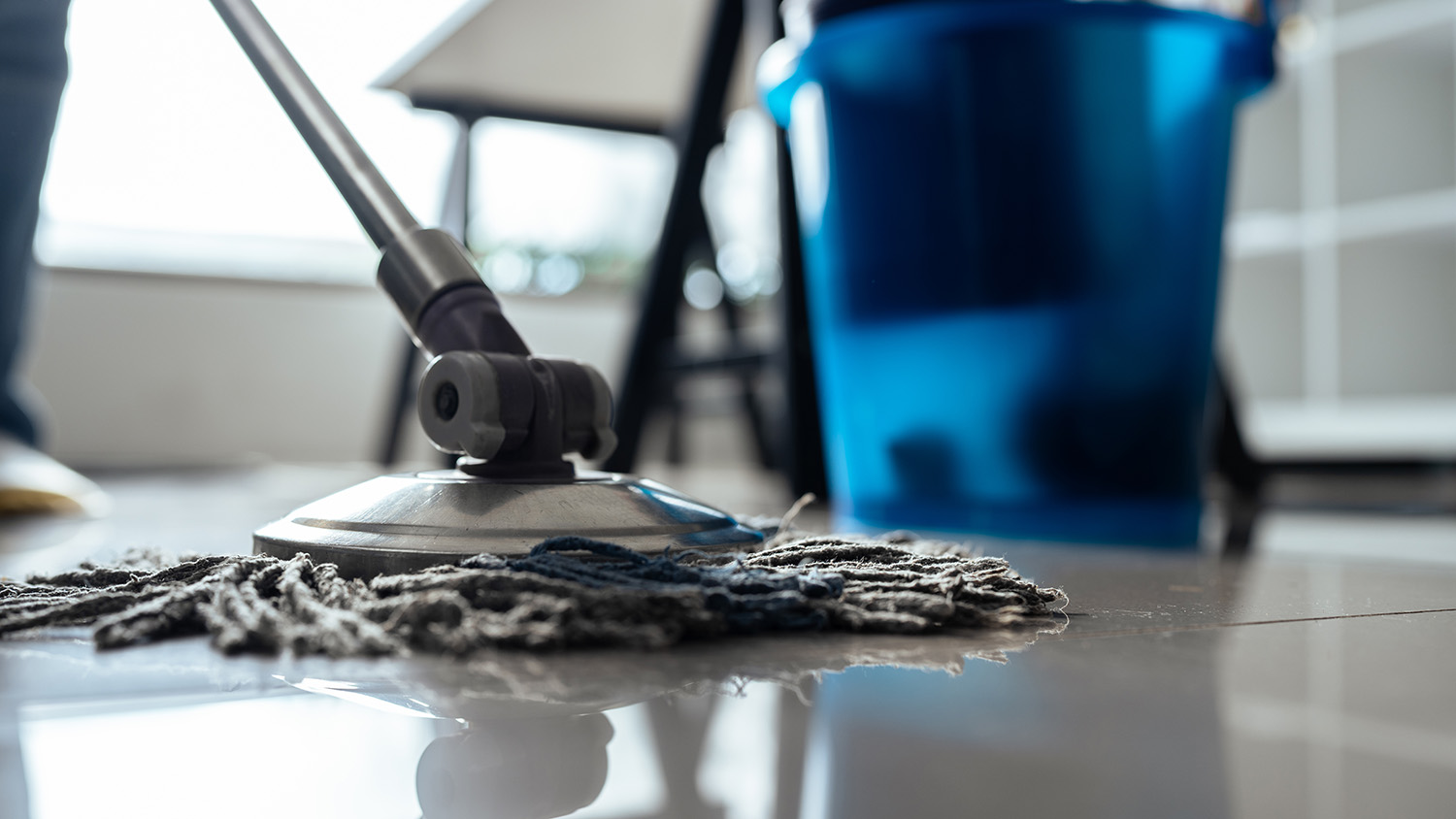 An image of a mophead on a floor