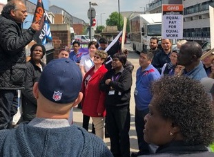 Porters, cleaners and domestic staff who work for Sodexo at three London hospitals have protested over low wages.