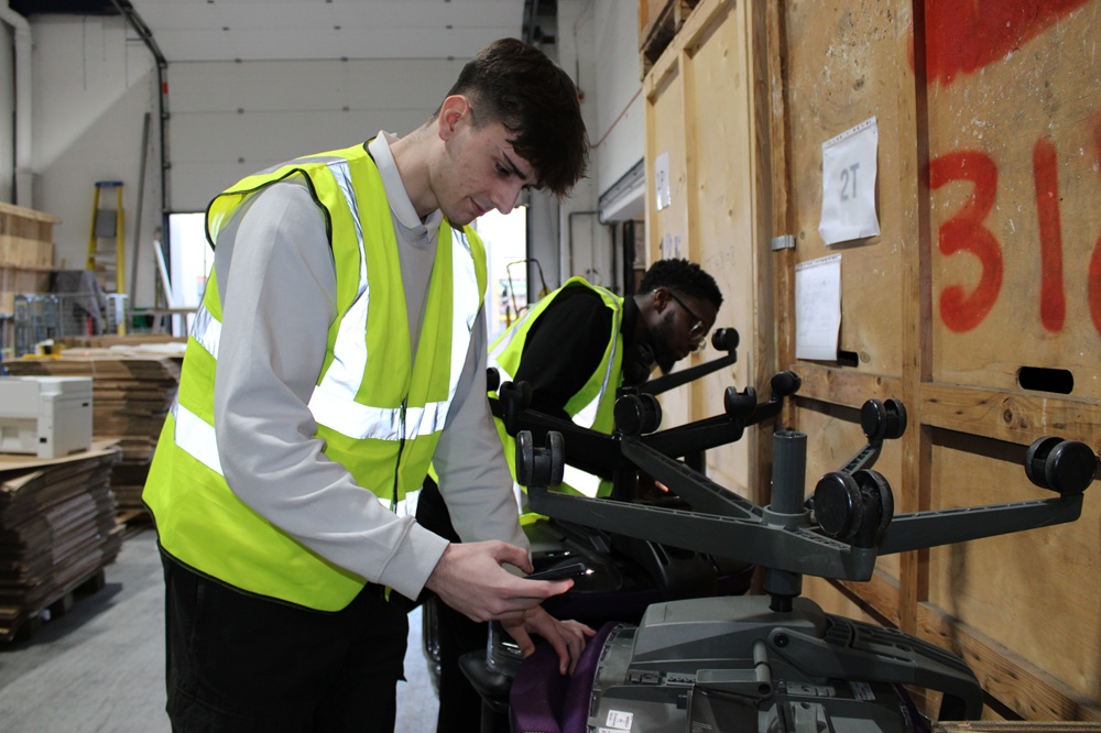 An image of an employee using Johnsons Asset 360 on furniture