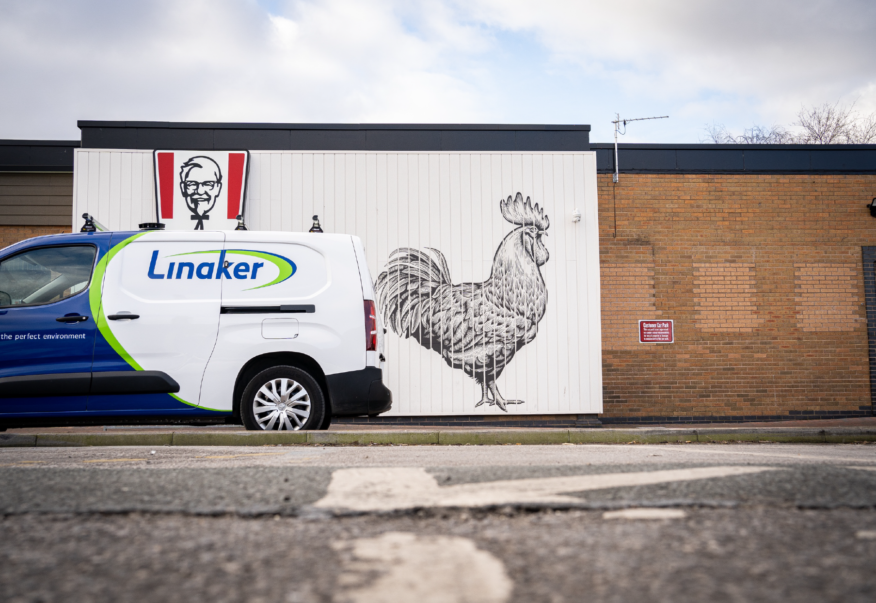 A Linaker van next to KFC branding