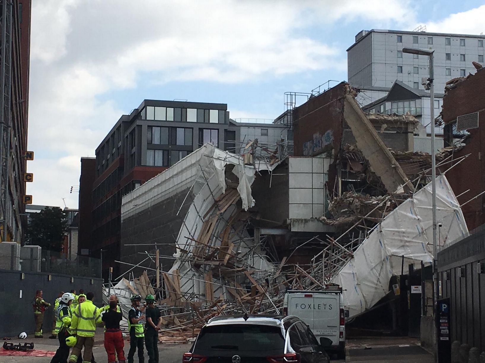 The scaffolding had been erected on the demolition site of what is called the  Station Hill development