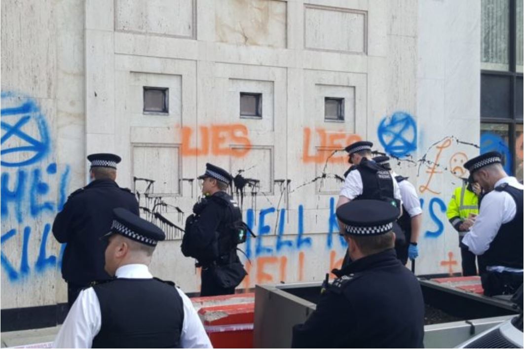 Extinction Rebellion activists have escalated their environmental campaign to include an attack on a Shell building in London