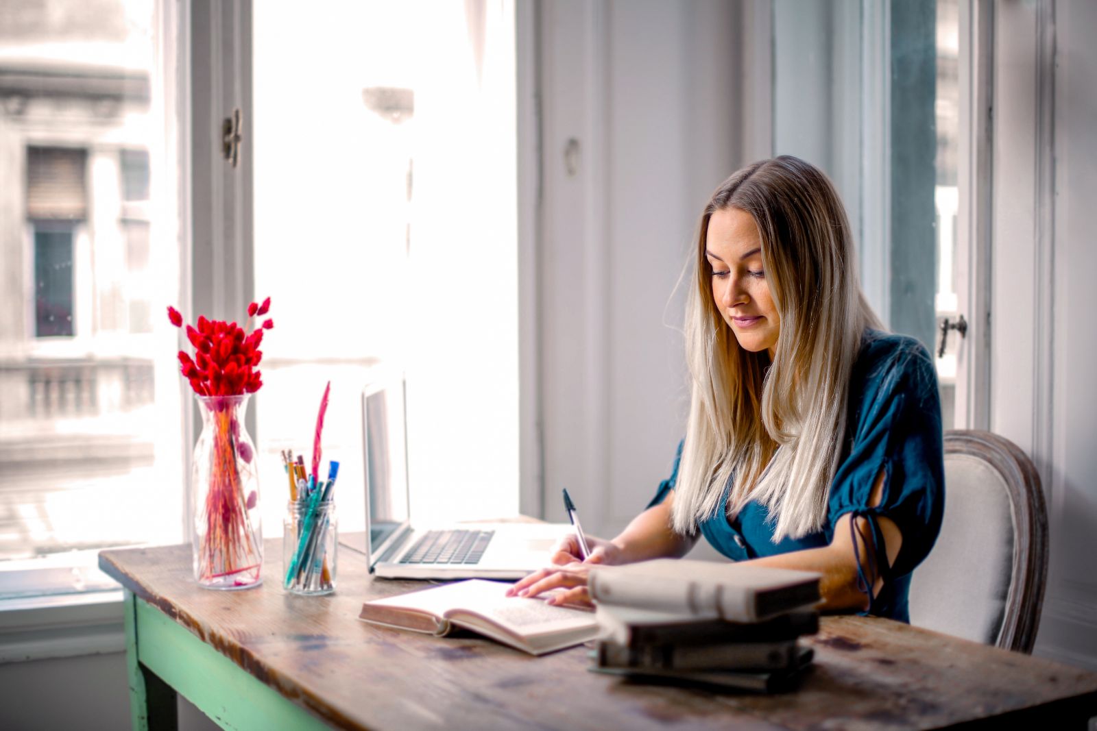 Woman in blue long sleeved shirt